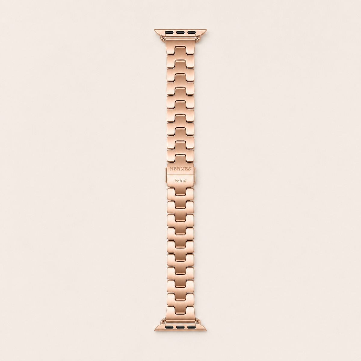 Rose-gold Hermès Grand H Fin band laid flat, full-length view
