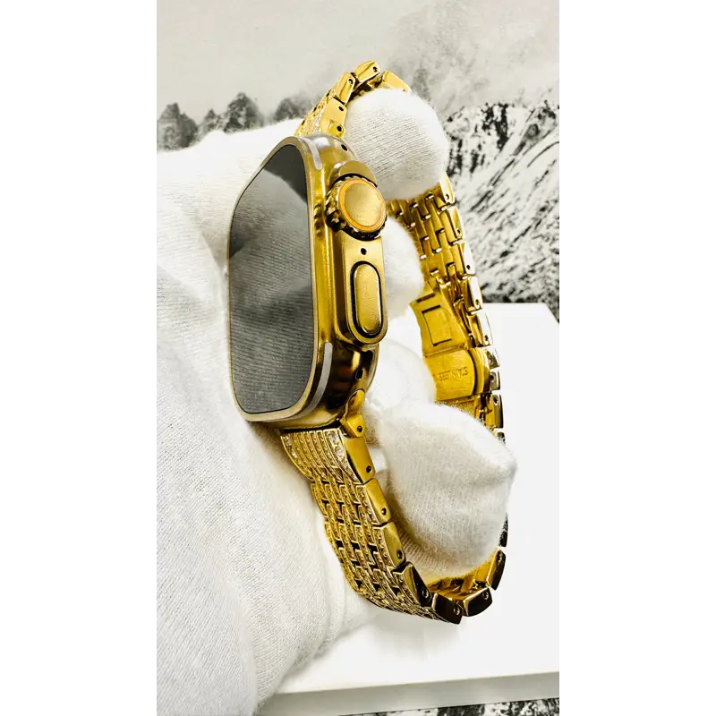 Custom Apple Watch Ultra 2 49mm with a golden-anodized case and gold-plated rhinestone band