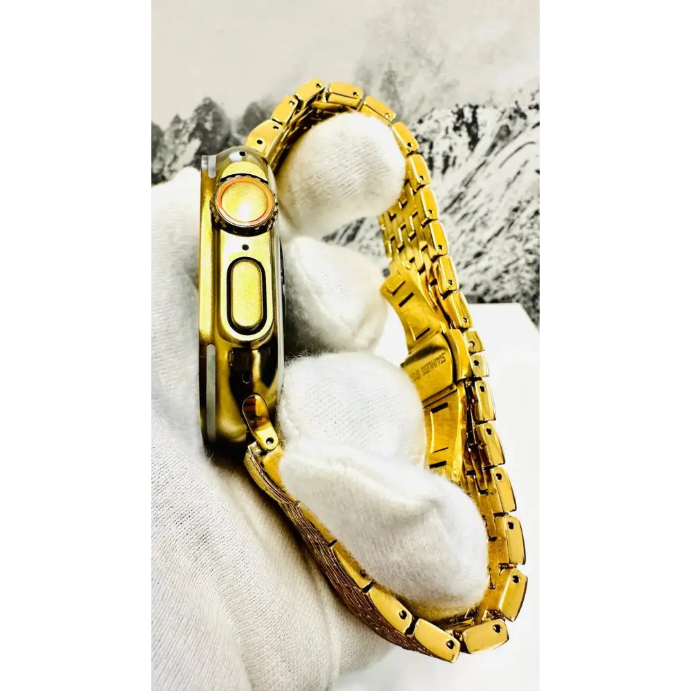 Custom Apple Watch Ultra 2 49mm with a golden-anodized case and gold-plated rhinestone band