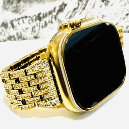 Custom Apple Watch Ultra 2 49mm with a golden-anodized case and gold-plated rhinestone band