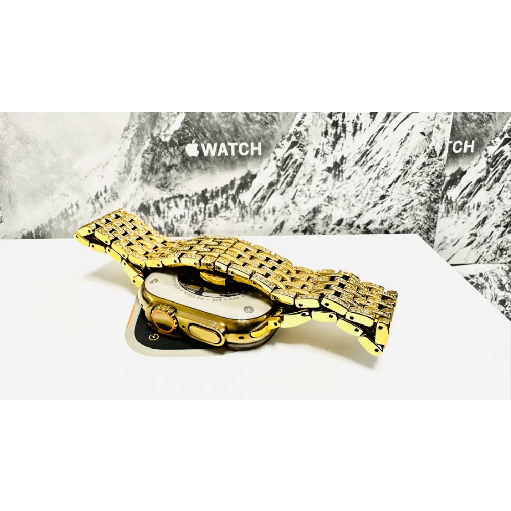 Custom Apple Watch Ultra 2 49mm with a golden-anodized case and gold-plated rhinestone band