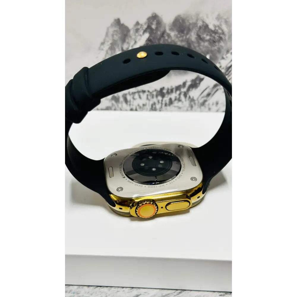 Custom diamond polished and anodized gold Apple Watch Ultra 2 49mm titanium with a Black Sport Band 24k Gold Pin