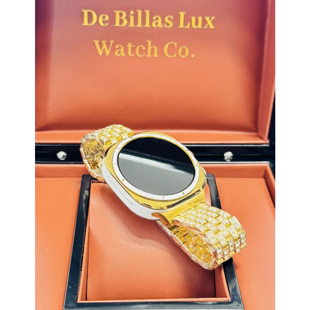 Custom Samsung Galaxy Watch Ultra 47mm with a golden-anodized case and 24K gold-plated rhinestone band