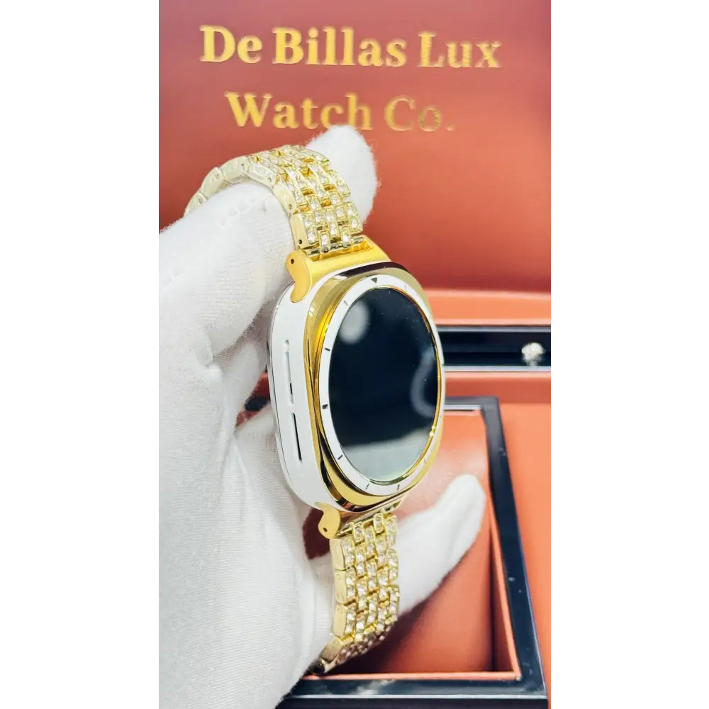Custom Samsung Galaxy Watch Ultra 47mm with a golden-anodized case and 24K gold-plated rhinestone band