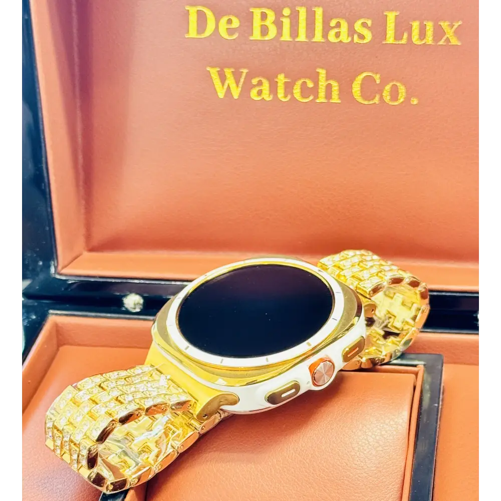 Custom Samsung Galaxy Watch Ultra 47mm with a golden-anodized case and 24K gold-plated rhinestone band