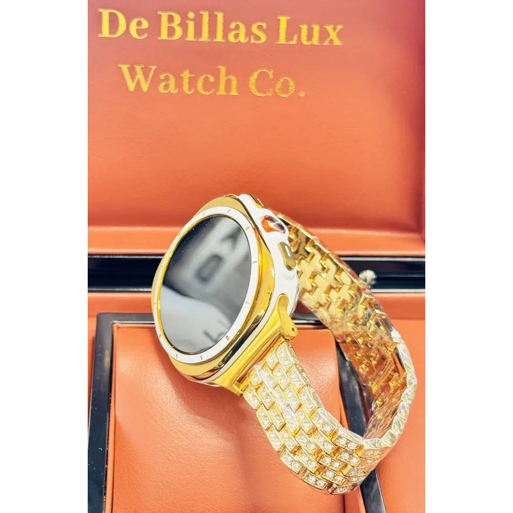 Custom Samsung Galaxy Watch Ultra 47mm with a golden-anodized case and 24K gold-plated rhinestone band