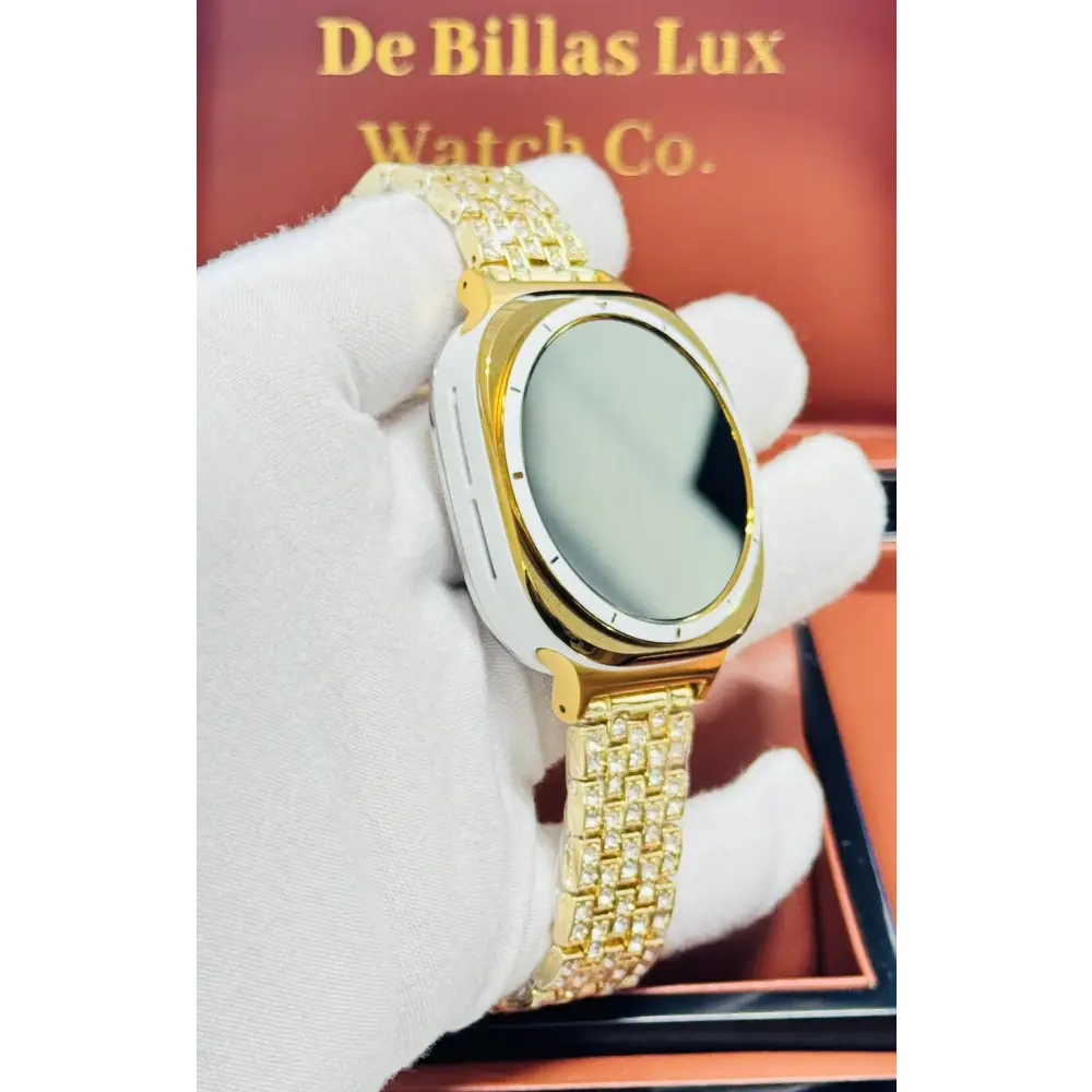 Custom Samsung Galaxy Watch Ultra 47mm with a golden-anodized case and 24K gold-plated rhinestone band