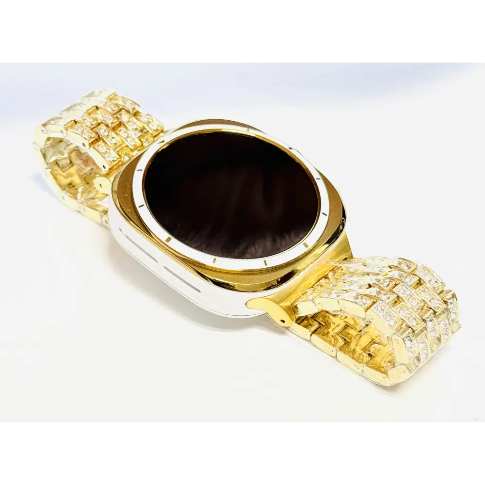 Custom Samsung Galaxy Watch Ultra 47mm with a golden-anodized case and 24K gold-plated rhinestone band
