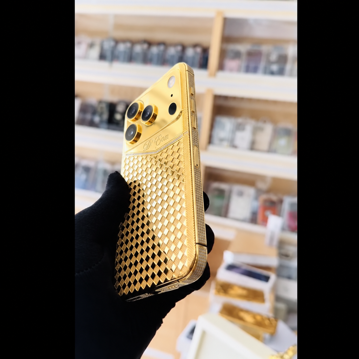 De Billas Lux custom gold Rhomboid phone — rear view 3, three cameras at left and flash, microphone and LiDAR at right
