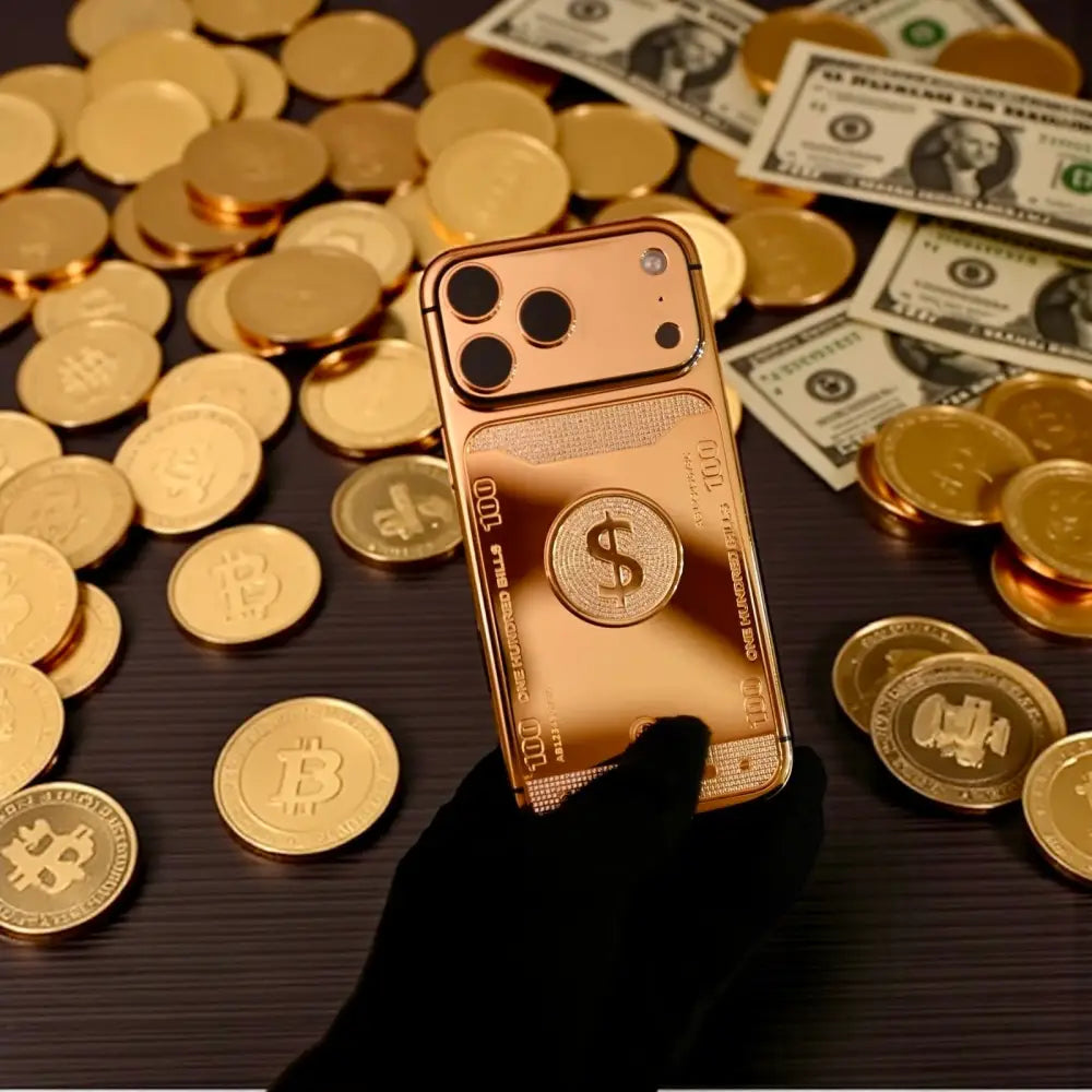 Gold-finish iPhone with dollar-symbol rear design, held above coins and banknotes