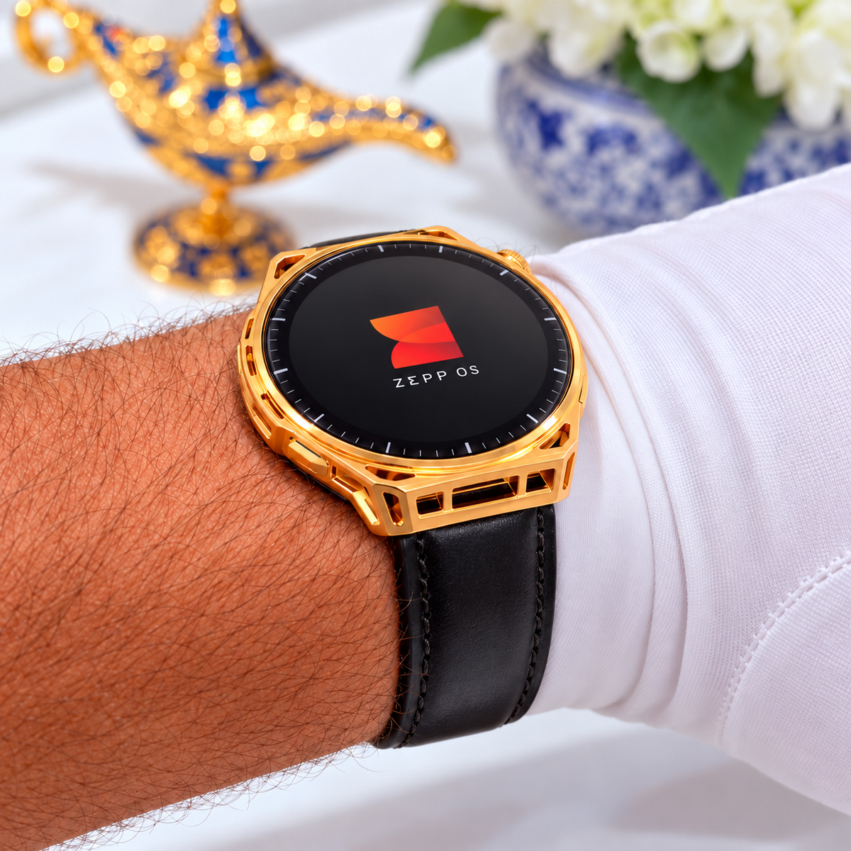 Custom gold Amazfit Balance 3 with black leather band displaying the Zepp OS startup screen