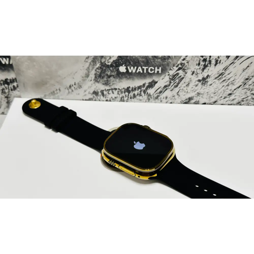 Custom diamond polished and anodized gold Apple Watch Ultra 2 49mm titanium with a Black Sport Band 24k Gold Pin
