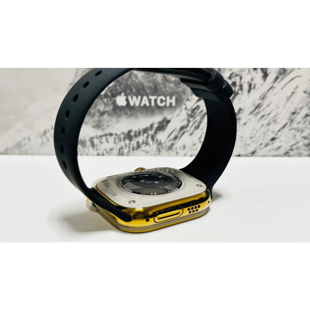 Custom diamond polished and anodized gold Apple Watch Ultra 2 49mm titanium with a Black Sport Band 24k Gold Pin