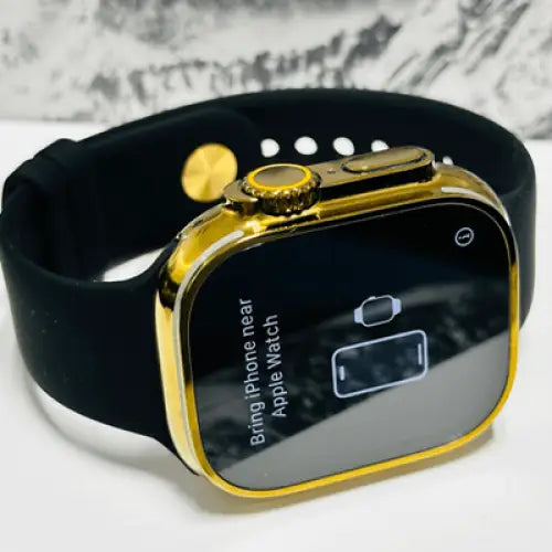 Custom diamond polished and anodized gold Apple Watch Ultra 2 49mm titanium with a Black Sport Band 24k Gold Pin