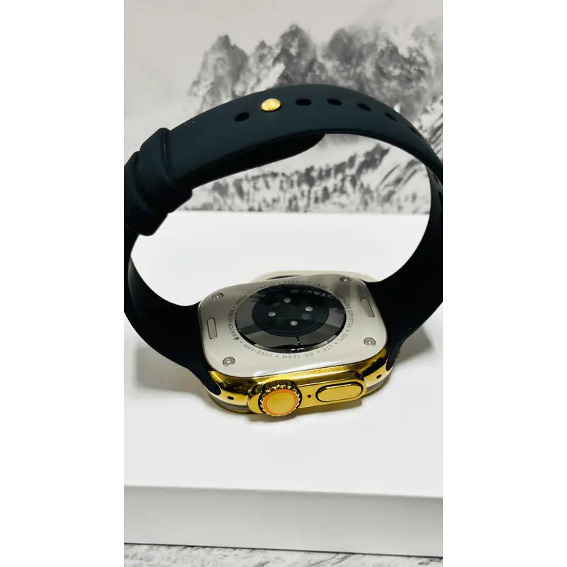 Custom diamond polished and anodized gold Apple Watch Ultra 2 49mm titanium with a Black Sport Band 24k Gold Pin