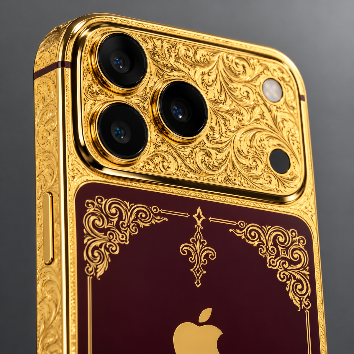 Custom iPhone 18 Pro Max in 24K gold and burgundy, close-up of the engraved gold camera surround