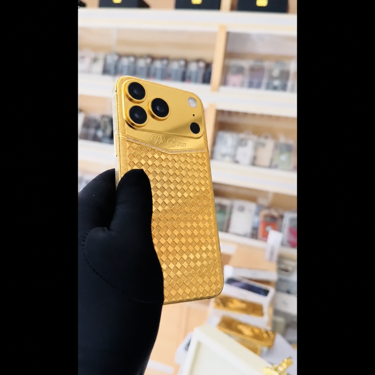 De Billas Lux custom gold Rhomboid phone — rear view 1, three cameras at left and flash, microphone and LiDAR at right