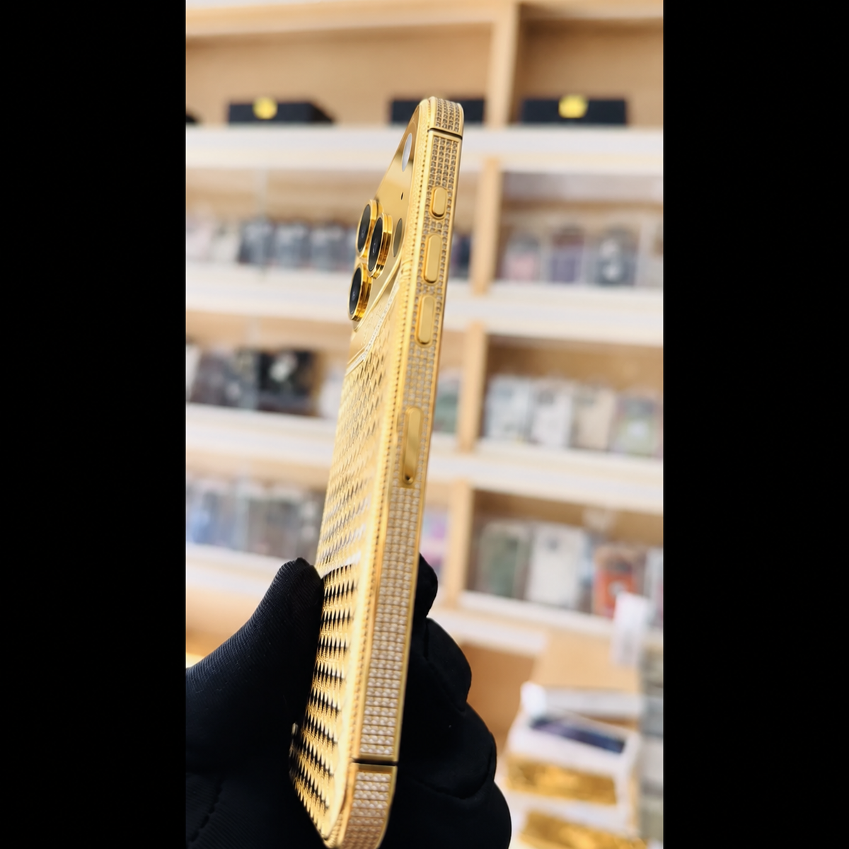 De Billas Lux custom gold Rhomboid phone — side detail, three cameras at left and flash, microphone and LiDAR at right
