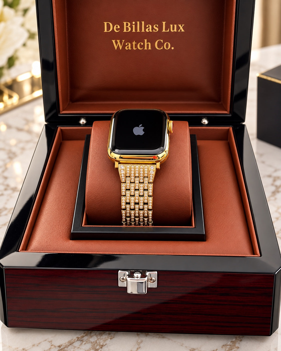 Custom 24K gold Apple Watch with rhinestone band in an open De Billas Lux wooden presentation box