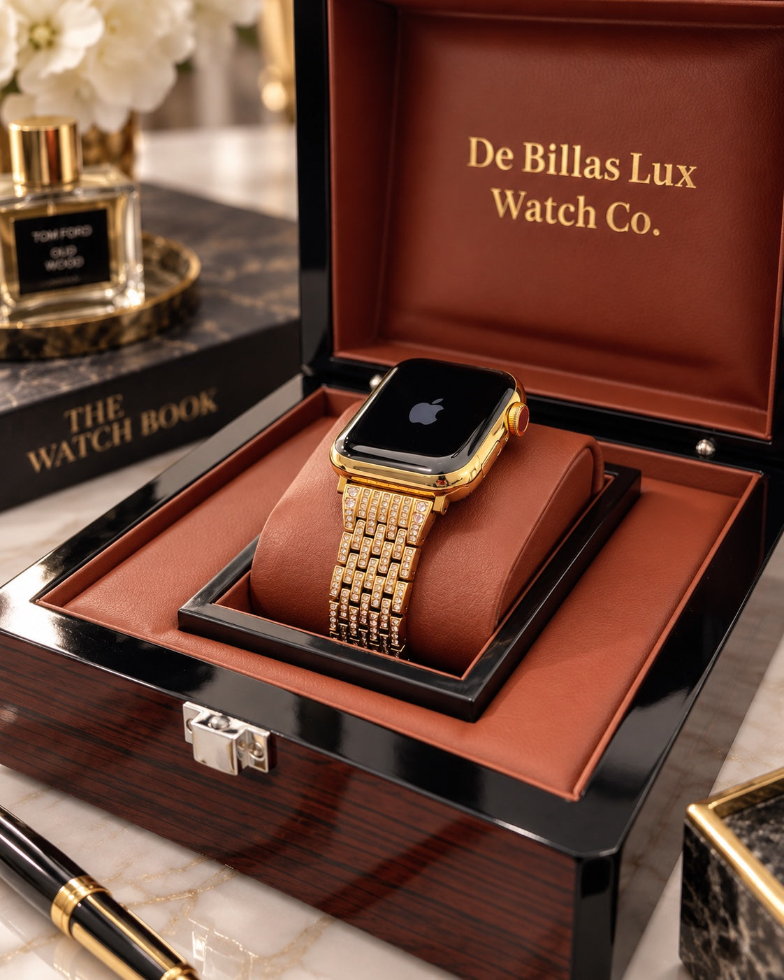 Custom gold Apple Watch with rhinestone link band in a De Billas Lux presentation box on a marble surface