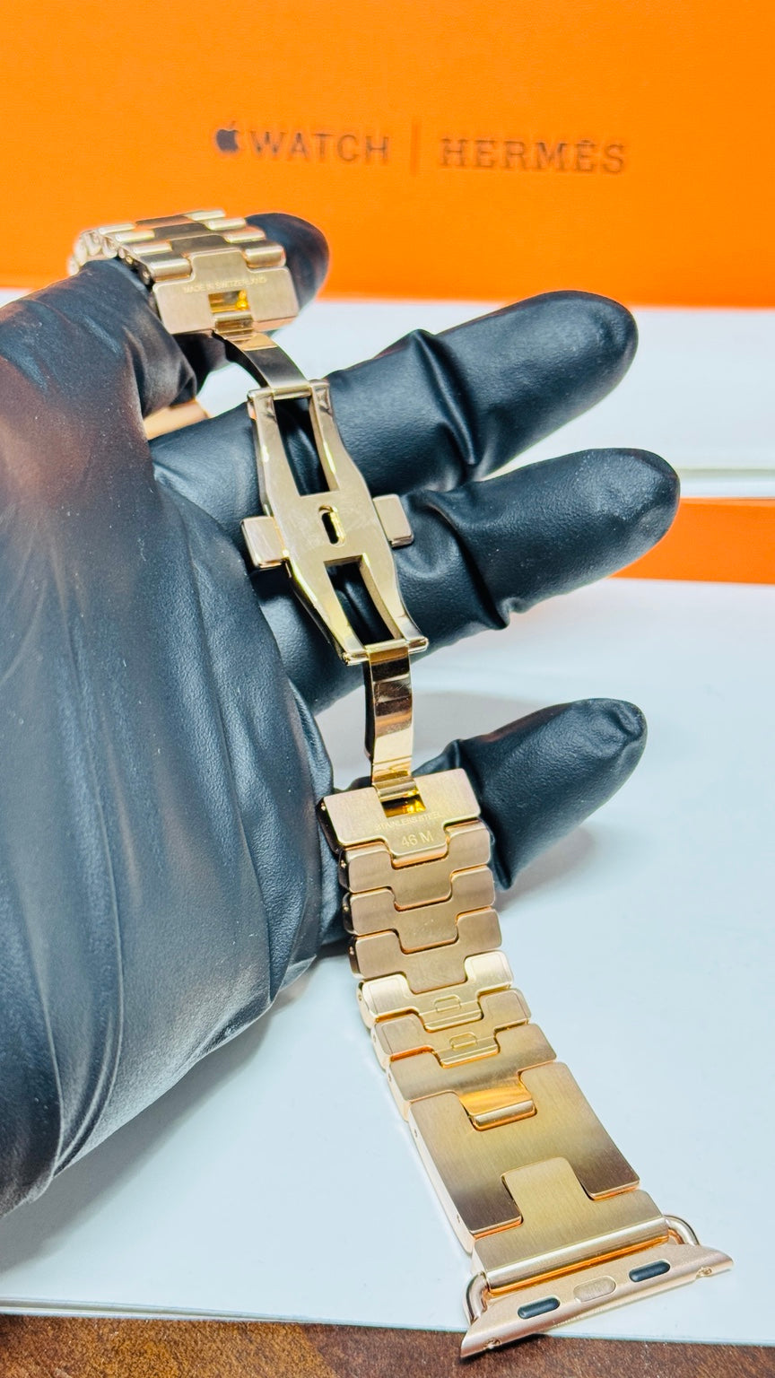 Authentic Hermès Grand H 46mm stainless steel band with custom rose gold plating — original product photo 1878