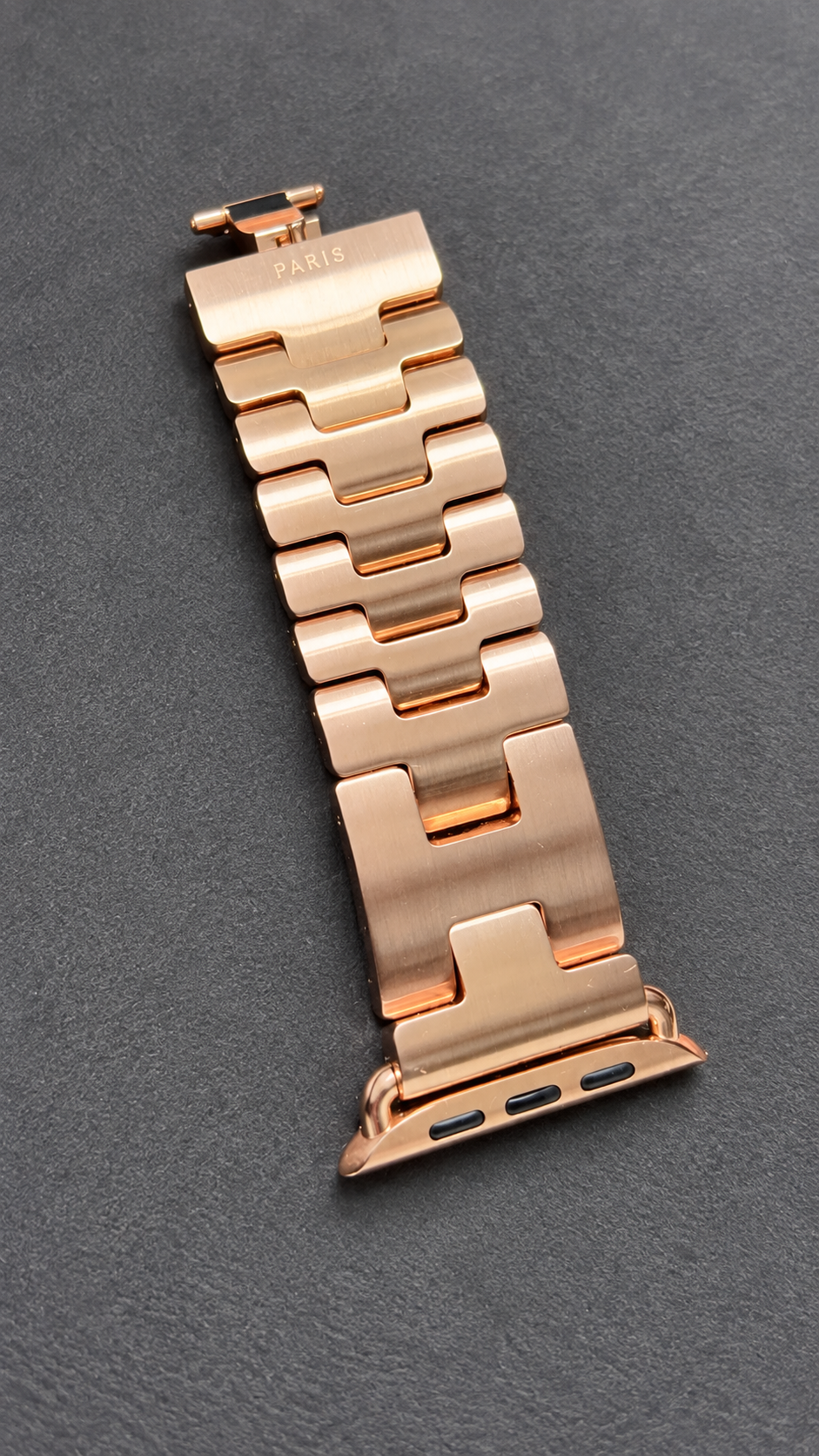 Rose gold plated Hermès Grand H interlocking H links and Apple Watch connector — generated supplemental detail