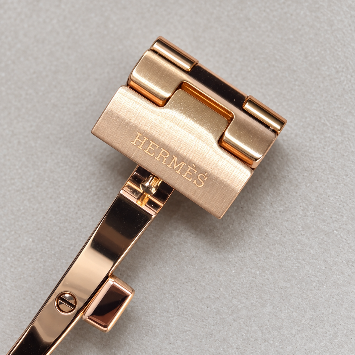 Hermès engraving on custom rose gold plated Grand H band clasp — generated supplemental detail