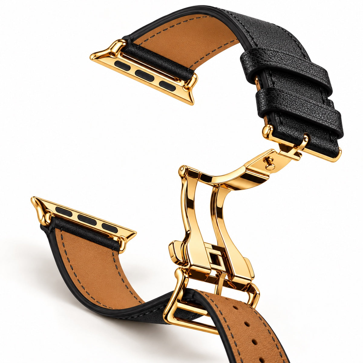 Open custom 24K gold deployment clasp and tan lining on Hermès Noir Apple Watch band