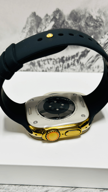 Custom diamond polished and anodized gold Apple Watch Ultra 2 49mm titanium with a Black Sport Band 24k Gold Pin
