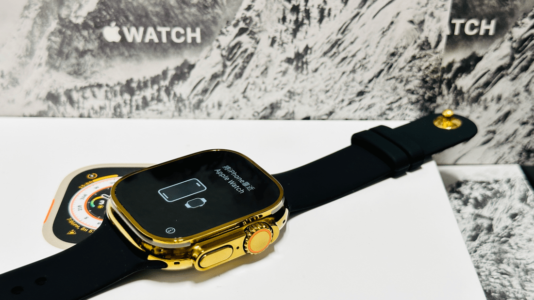 Custom diamond polished and anodized gold Apple Watch Ultra 2 49mm titanium with a Black Sport Band 24k Gold Pin