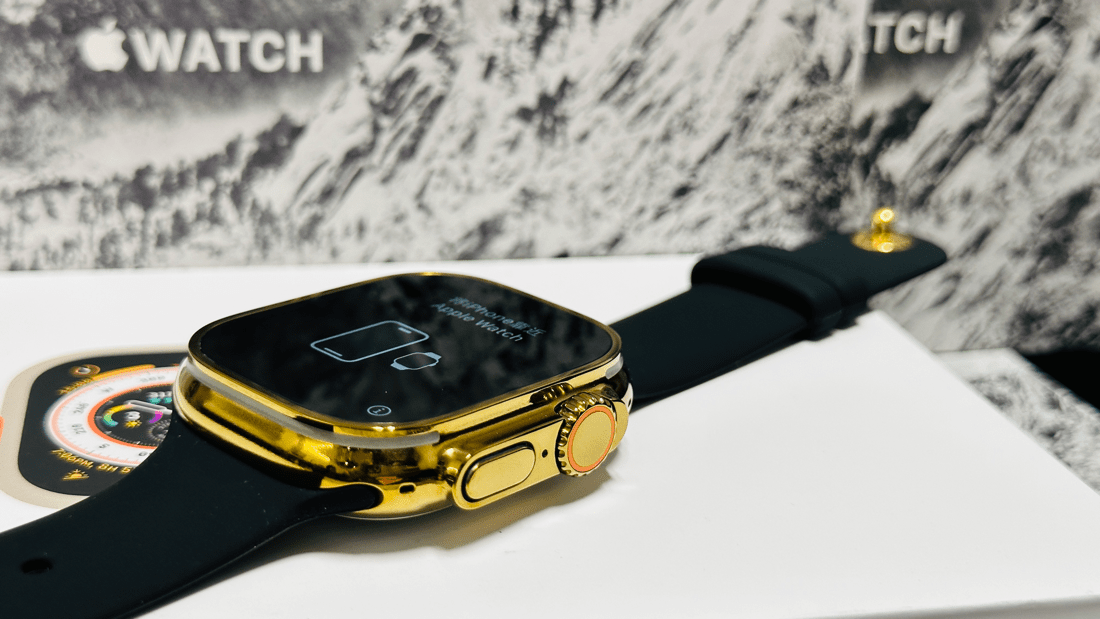 Custom diamond polished and anodized gold Apple Watch Ultra 2 49mm titanium with a Black Sport Band 24k Gold Pin