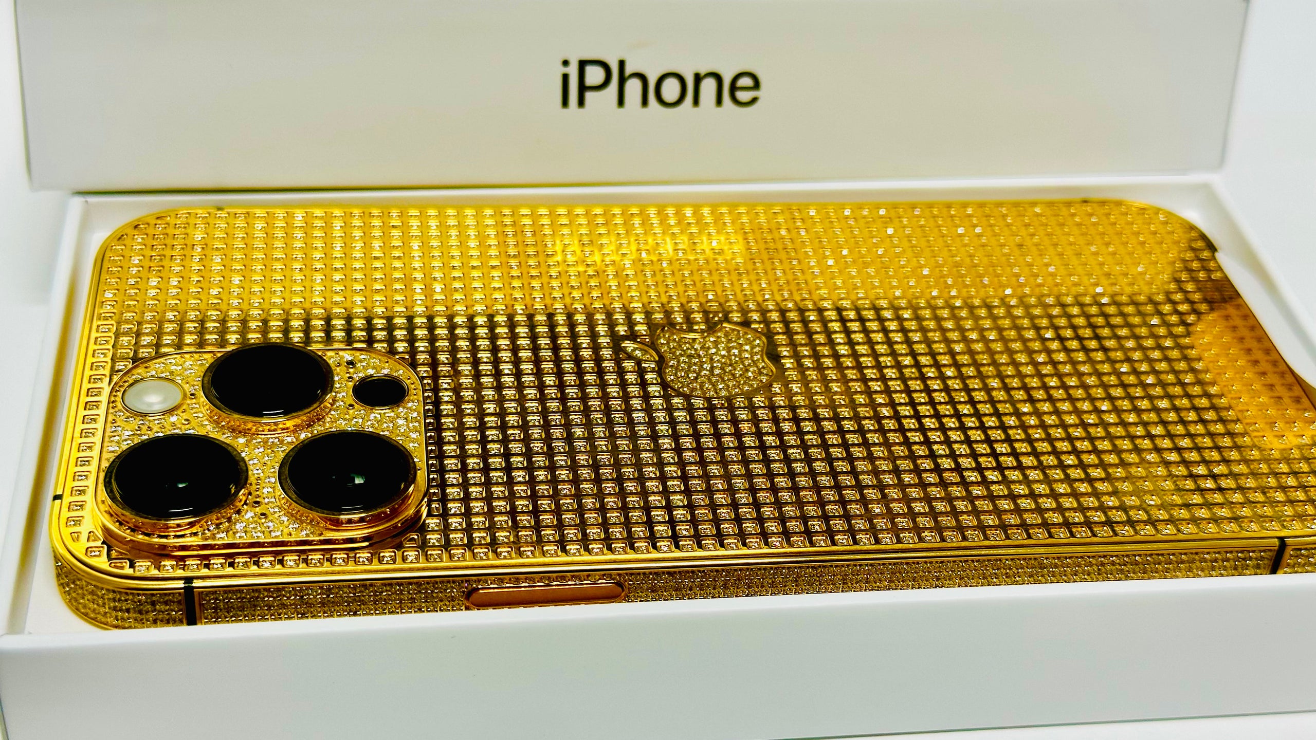Custom 24k Gold iPhone 14 Pro MAX with Diamonds